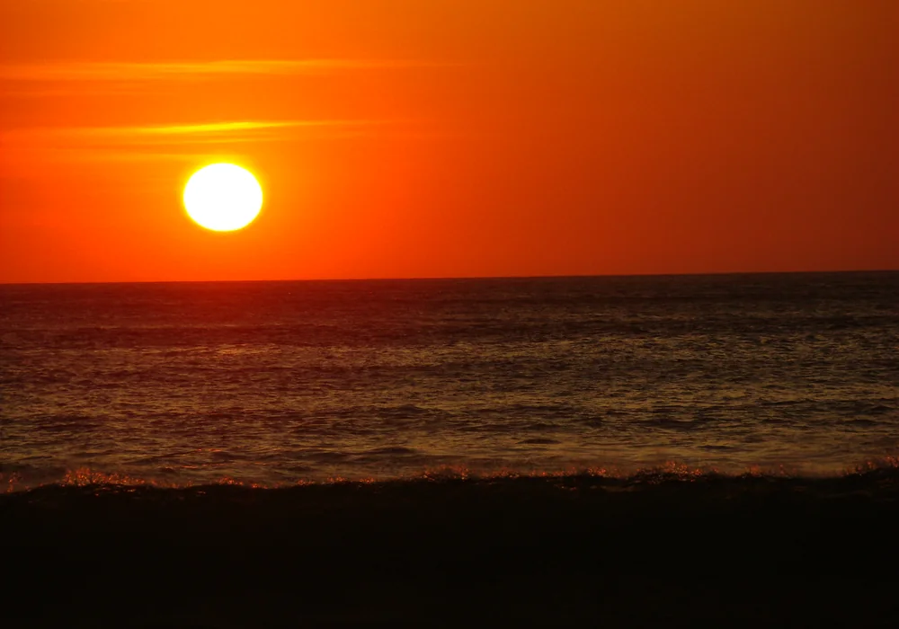 Sunset over the Pacific from the beach at Nosara