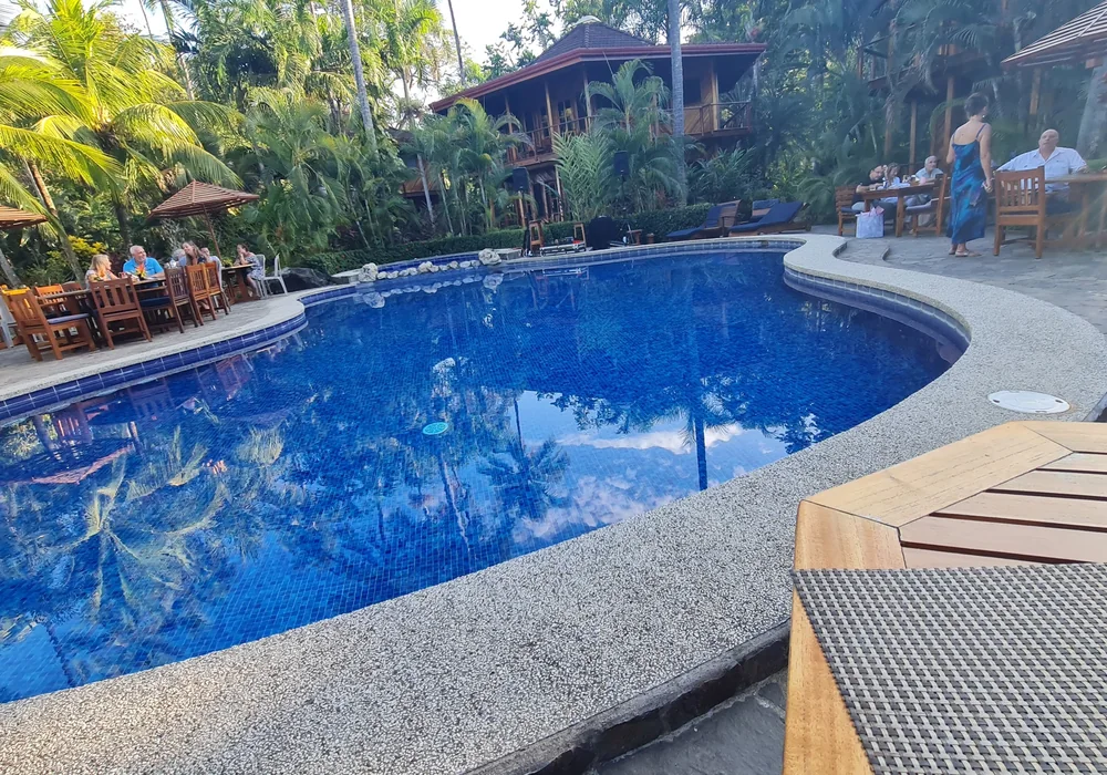 Hotel pool surrounded by tropical gardens in Costa Rica. Photo: Joshua ten Brink / WildPhotography.com