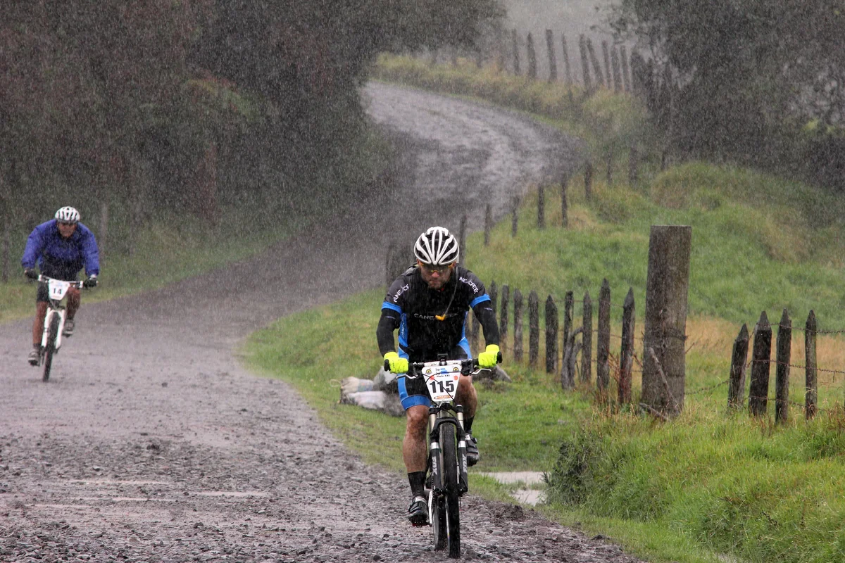 Mountain bikers on a dirt road in Costa Rica